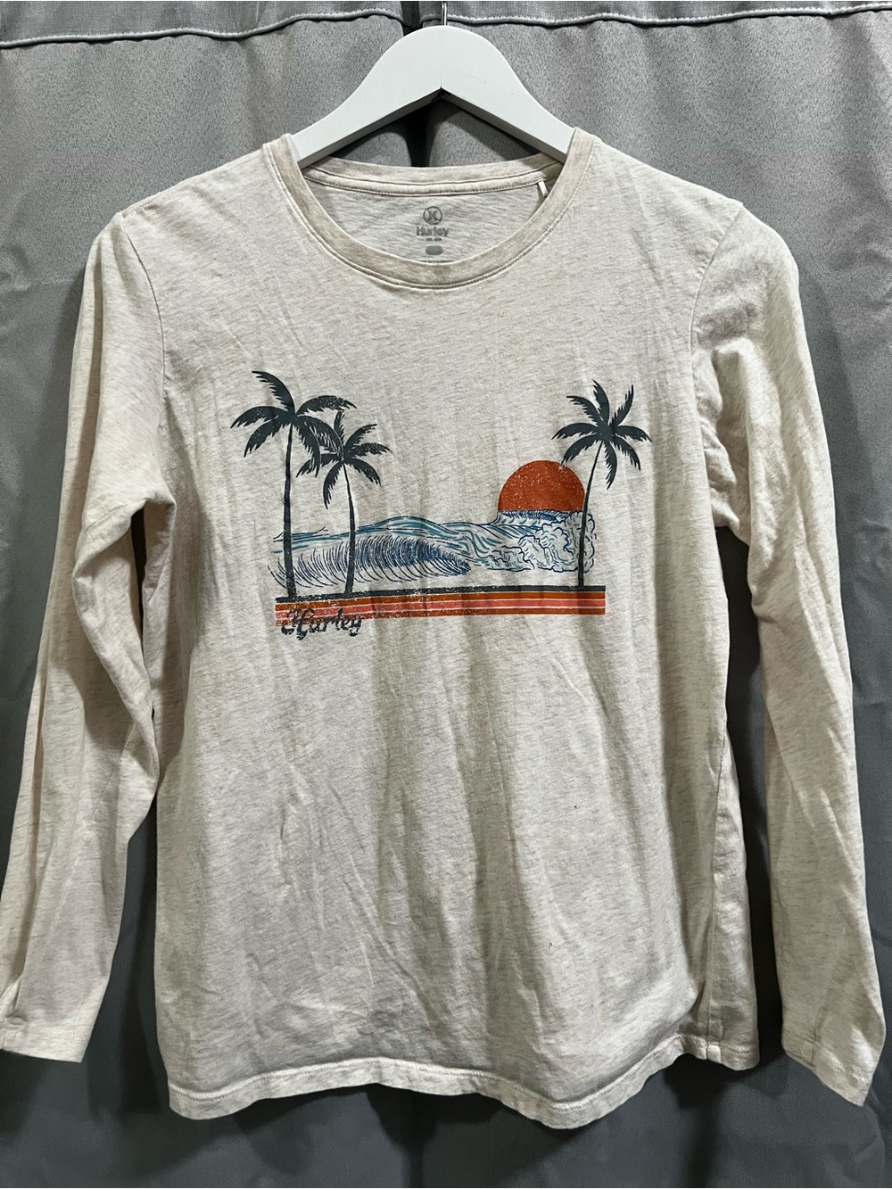 Hurley Cream Long-Sleeve Graphic Tee with Orange Sun and Navy Surf Art